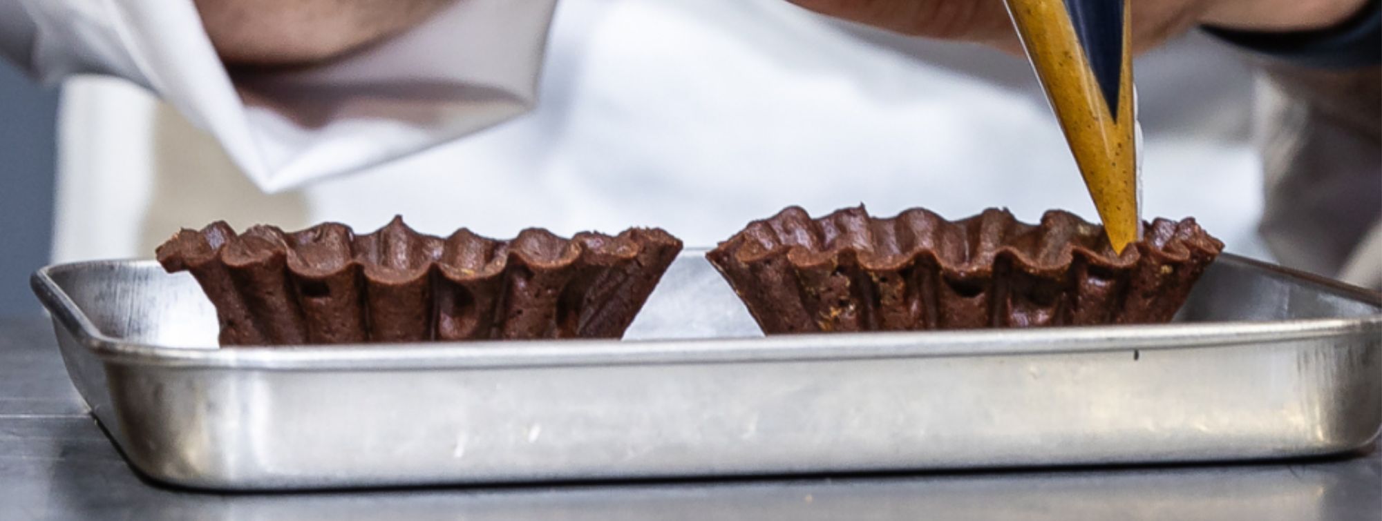 Poaching a pastry in progress.